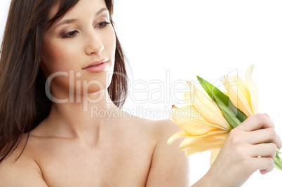 happy brunette with yellow lily flowers #2