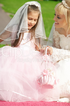 happy bride and little bridesmaid