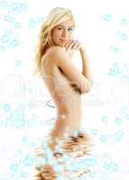 tanned blond in water with flowers #3