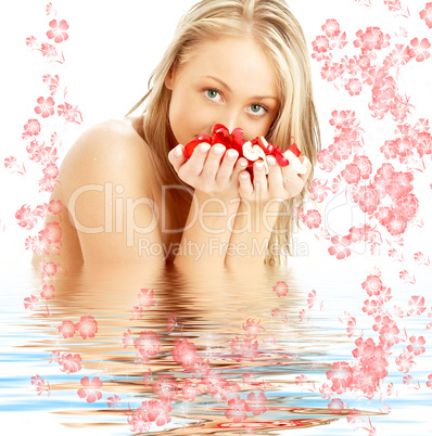 blond with red and white rose petals and flowers in water