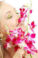 happy blond with orchid