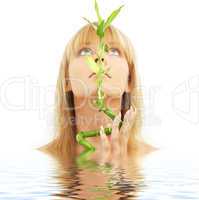 lovely blond with bamboo in water