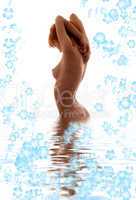 fit redhead standing in water with flowers