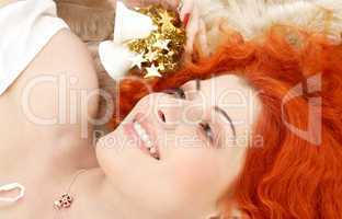 redhead girl with white christmas bells