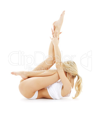 fit blond in white underwear practicing yoga