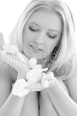monochrome blond in spa with white rose petals