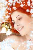 redhead girl with white christmas bells and snowflakes