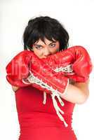 Female boxer with red handshoes