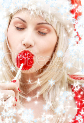 santa helper with lollipop and snowflakes