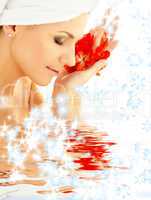 lady with red petals and snowflakes in water