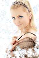lovely blond in fur jacket with snowflakes