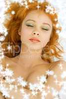 dreaming redhead with snowflakes