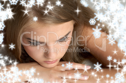 thoughtful girl with snowflakes