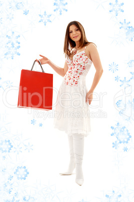 brunette with shopping bags and snowflakes