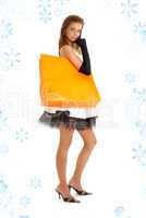 elegant lady with orange shopping bag and snowflakes #2