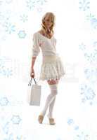 gorgeous blond with shopping bag and snowflakes #2