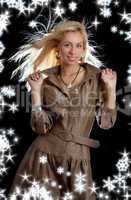 dancing blond in brown dress with snowflakes