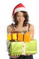 Pretty young woman with christmas gifts