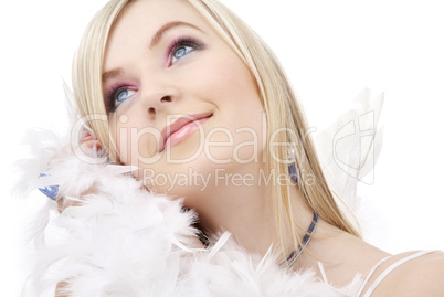 happy blond angel girl with feather boa
