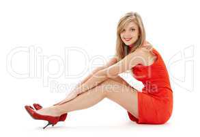 sitting girl in red dress