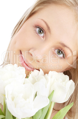happy girl with white tulips