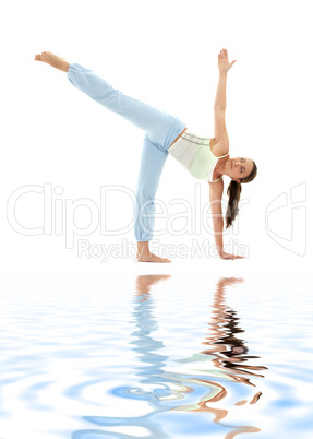 ardha chandrasana half moon pose on white sand