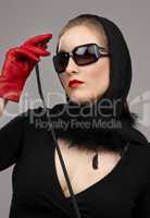 lady in red gloves with crop