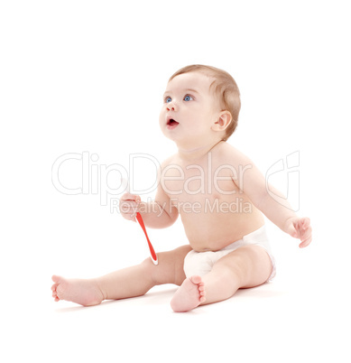 baby boy in diaper with toothbrush #2