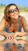 smiling bikini girl on sand