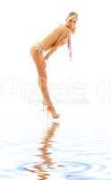 golden heels girl in bikini on white sand #2