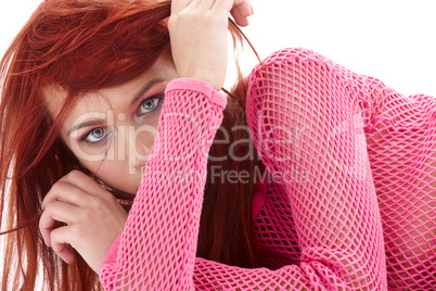 mysterious redhead in pink fishnet