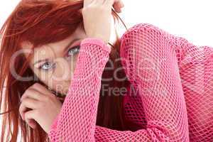 mysterious redhead in pink fishnet