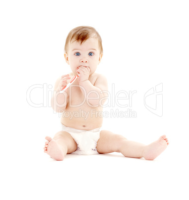 baby boy in diaper with toothbrush #3