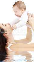happy mother with baby boy in water #2