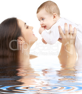 happy mother with baby boy in water #2