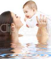 happy mother with baby boy in water #2