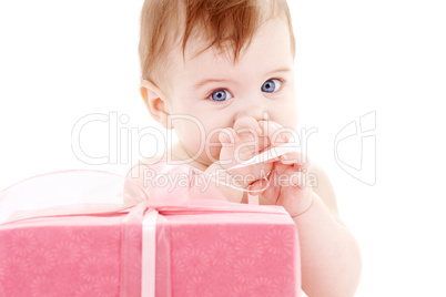 baby boy with gift box