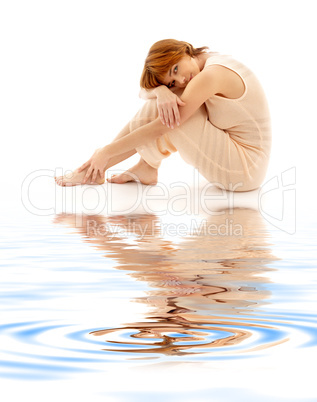 relaxed lady on white sand