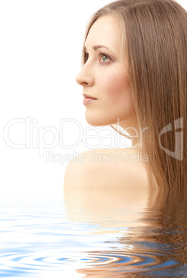 beautiful woman with long hair in water