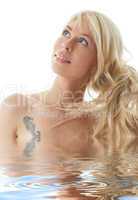 happy blonde girl in water