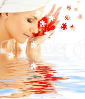 lady with red petals in water