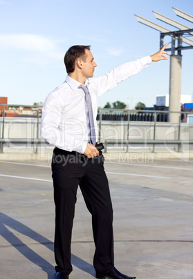 businessman in a front of a building site