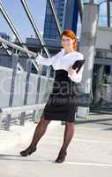 businesswoman in a front of a building site