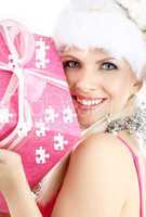 santa helper girl with pink puzzle gift box