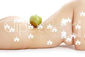 puzzle of woman torso with green apple