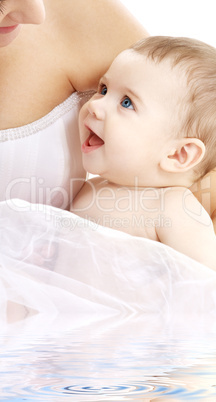 happy baby boy with mama in water