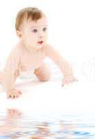 crawling baby boy in diaper