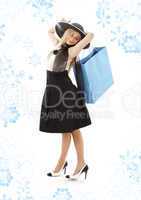 blond in retro hat with blue shopping bag