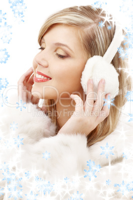 smiling blond in furry headphones