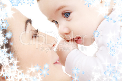happy mother playing with baby boy happy mother playing with baby boy